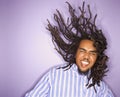 Man with his dreadlocks in motion. Royalty Free Stock Photo