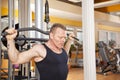 Man in his forties exercising in gym Royalty Free Stock Photo