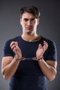 The man with his hands handcuffed in criminal concept