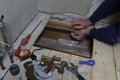 Plumber constructing pipework