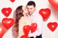 Man with his lovely sweetheart girl kiss at Lover`s valentine day. Valentine Couple. Couple kiss and hug. Royalty Free Stock Photo