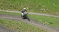 Man on his mountain bike going down the path from Jochpass over Engelberg in the Swiss Alps Royalty Free Stock Photo