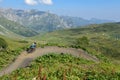 Man on his mountain bike going down the path from Jochpass Royalty Free Stock Photo