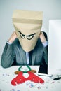 Man in his office with a paper bag in his head in christmas Royalty Free Stock Photo