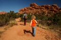 A man with his son are hiking in mountains Royalty Free Stock Photo