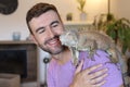 Man and his spectacular Iguana Royalty Free Stock Photo