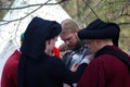 Man in historical costume (a knight) prepares for a battle. Royalty Free Stock Photo