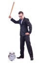 Man hitting the clock with baseball bat Royalty Free Stock Photo