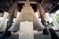 Man hitting the Mingun bell in Myanmar. Royalty Free Stock Photo