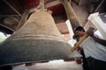 Man hitting the Mingun bell in Myanmar. Royalty Free Stock Photo