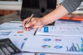 Man hoding pen to point in paperwork, meeting concept Royalty Free Stock Photo