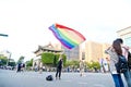 A man hold a big rainbow flag in the Taipei LGBTQIA pride, Taiwan. October 28, 2017.