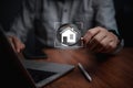 Man hold magnifying glass searching house. real estate agency, property insurance, mortgage loan or new home Royalty Free Stock Photo