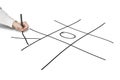 Man hold pen drawing Tic-Tac-Toe game on white Royalty Free Stock Photo