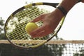 Man hold racket and tennis ball, close up Royalty Free Stock Photo