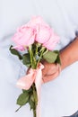 Man hold rose flower behind for surprise his wife Royalty Free Stock Photo