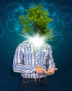 Man hold smart phone. Green tree instead his head Royalty Free Stock Photo