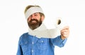 Man hold toilet paper. Hipster Guy having fun. Softness strength and absorbency. Prevent Toilet Paper Hoarding. Shortage Royalty Free Stock Photo