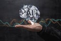 Man hold a virtual hologram of an artificial intelligence brain with waves of digital data and futuristic technological elements. Royalty Free Stock Photo