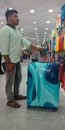 man holded trolley bag at  shopping mall Royalty Free Stock Photo