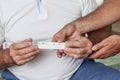 Man holdin a pillbox Royalty Free Stock Photo