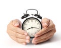 Man holding alarm clock in hands Royalty Free Stock Photo
