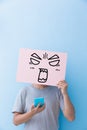 Man holding angry expression billboard