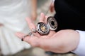 A man holding an antique pocketwatch