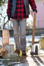 Man holding an axe for chopping firewood Royalty Free Stock Photo