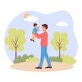 Man holding baby boy. Happy father walking with his baby son in the park. Royalty Free Stock Photo