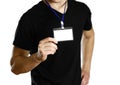 Man holding a badge. Close up. Isolated background Royalty Free Stock Photo