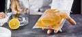 Man holding bag with SCOBY to make kombucha tea