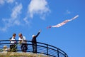 A man holding a banner saying happy birthday