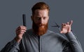 man holding barber scissors and comb. barber with hairstyle. barber man making hairstyle