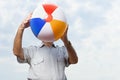 Man holding a beachball Royalty Free Stock Photo