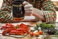 Man holding a beer mug. Boiled red crayfishes on a wooden table. Royalty Free Stock Photo