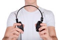 Man holding black headphones. Royalty Free Stock Photo