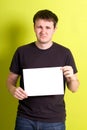 Man holding a blank paper Royalty Free Stock Photo