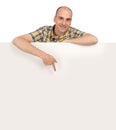 Man holding blank poster