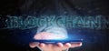 Man holding a Blockchain title on a background