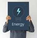 Man holding a board with Energy concept Royalty Free Stock Photo