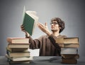 Man holding a book, making a discovery Royalty Free Stock Photo