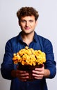 Man holding bucket with flowers Royalty Free Stock Photo