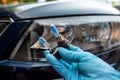 man holding bulb for repair car light Royalty Free Stock Photo