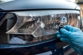 man holding bulb for repair car light Royalty Free Stock Photo