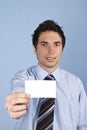 Man holding a business card Royalty Free Stock Photo