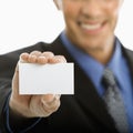 Man holding business card. Royalty Free Stock Photo