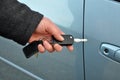 Man holding car key Royalty Free Stock Photo