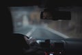 Man holding car steering wheel. Concept of safe driving Royalty Free Stock Photo