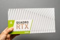 Man holding cardboard box of latest Nvidia Quadro RTX 5000 GPU Royalty Free Stock Photo